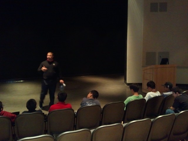 They start the session in an auditorium.